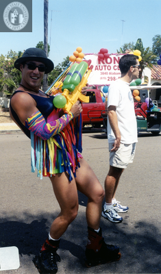 Person with water gun at Pride parade, 2000