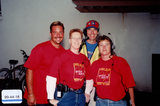 Volunteers with headsets at a Pride event, 1999