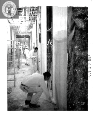 Plastering the west corridor, Aztec Center, 1967