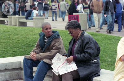 Couple with Open House brochure, 1998