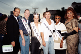 Miss, Mr., and Ms. Gay Pride group picture at Pride parade, 1998