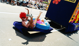 Finny Dippers float with kiddie pool in Pride parade, 1998