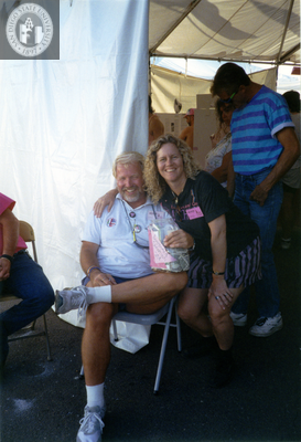 Debbie Zierman with her arm around donation collector, 1992