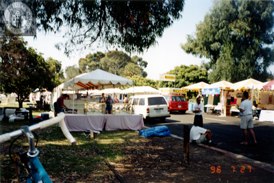 Booths and people at Pride festival, 1996
