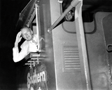 Lionel Van Deerlin in the engineer's cab of a Southern Pacific train