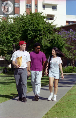 Students walk away from Zura Hall, 1996
