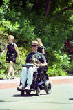 Student in power wheelchair on Hilltop Way, 1996
