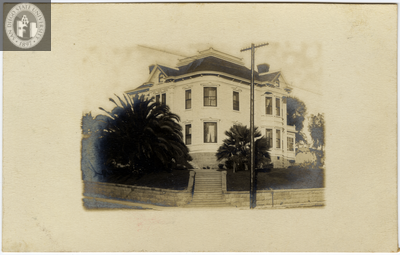 Early San Diego home with telephone pole in front