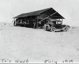 Automobile and house, 1919