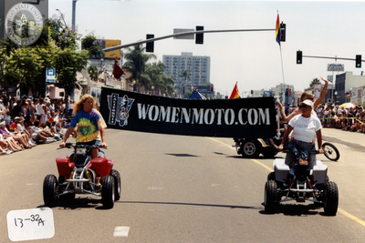 Womenmoto.com banner in Pride parade, 2000