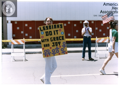 Diane Germain's "Lesbians Do It With Grace and Joy" sign at Pride parade, 1988