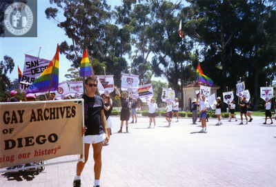Frank Nobiletti with Lesbian and Gay Archives of San Diego banner, 1992