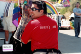 Volunteer with "Mandy's Ass" shirt at Pride event, 1999