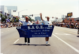 Seniors Active in a Gay Environment banner in parade, 1994