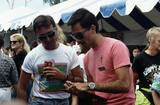 Peter Cooper, AIDS Foundation of San Diego, signs someone up, 1991