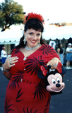Candye Kane in red vintage dress at Pride Parade, 1996