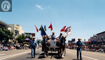 Rodeo marchers with horse-drawn carriage at Pride parade, 1997