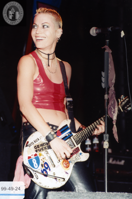 Performer playing guitar at Pride Festival, 1999