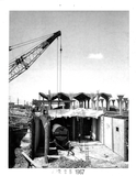 Setting chiller unit, Aztec Center construction, 1967
