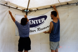 Volunteers setting up Center tent at Pride festival, 1998