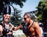 Man kisses ring of archbishop of leather at Pride Festival, 1998