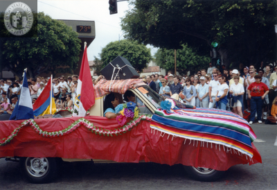 Car decorated with Latin American flags in Pride parade, 1991