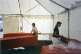 Setting up tables at the Lesbian and Gay Archives of San Diego tent, 1992