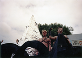 Men in leather gear on float at Pride parade, 1991