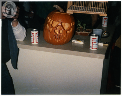 Carved pumpkin on table at a Halloween party
