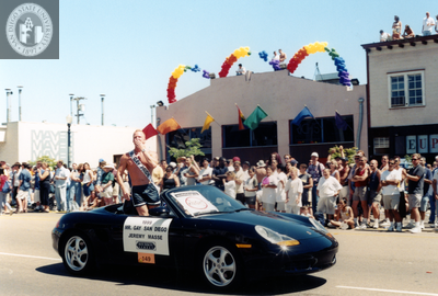 Jeremy Masse, Mr. Gay San Diego, blowing a kiss in Pride parade, 1999