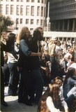 Two men embrace at Los Angeles antiwar march, 1971