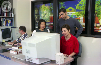 Students watch computer monitor, 1999