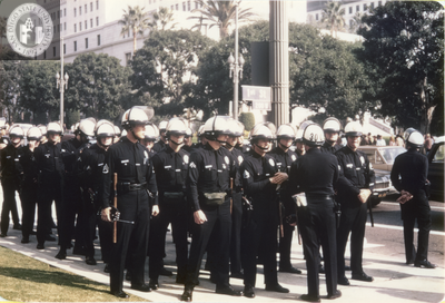 Police line up in riot gear at Los Angeles antiwar march, 1971