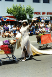 Drag queen pushing a shopping cart in San Diego Pride parade, 1994