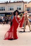 Marcher with "San Diego Closet Ball" sash in Pride parade, 1999