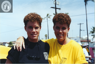 Similar haircuts at San Diego Pride, 1996