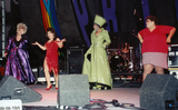 Drag queen performers on the main stage at the Pride Festival, 1999