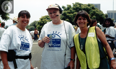 People with "Share the Vision" T-shirts in San Diego Pride Parade, 1997