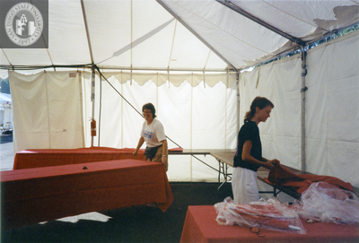 Setting up tables at the Lesbian and Gay Archives of San Diego tent, 1992