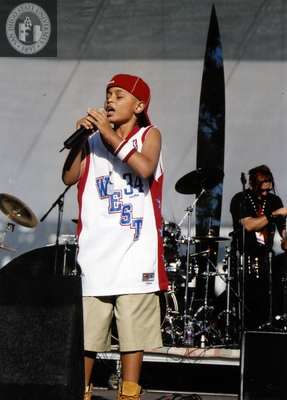 Singer wearing "West" jersey on Pride festival Main Stage, 2004