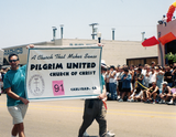 Pilgrim United Church of Christ banner at Pride parade, 1998