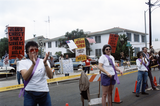Religious protestors stand with traffic cones on Pride Parade route, 1991