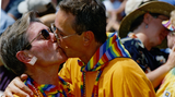 Couple kisses at Commitment Ceremony, 2001