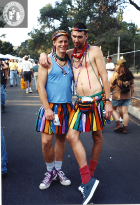 Men in matching rainbow skirts at Pride festival, 1996