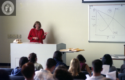 Instructor with dry erase board, 1996