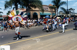 Costumed marchers with drums in Pride parade, 2000