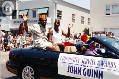 Johnny L. Guinn in convertible at Pride Parade, 1996