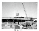 Installing cooling tower, Aztec Center construction, 1967