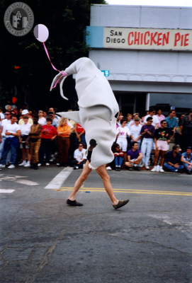 Marcher in shark costume in Pride parade, 1991