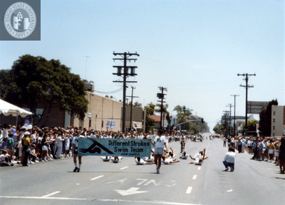 Different Strokes Swim Team banner in Pride parade, 1988